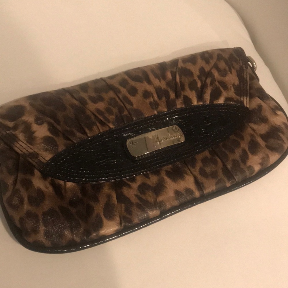 Guess by Marciano. Leopard and Gold clutch